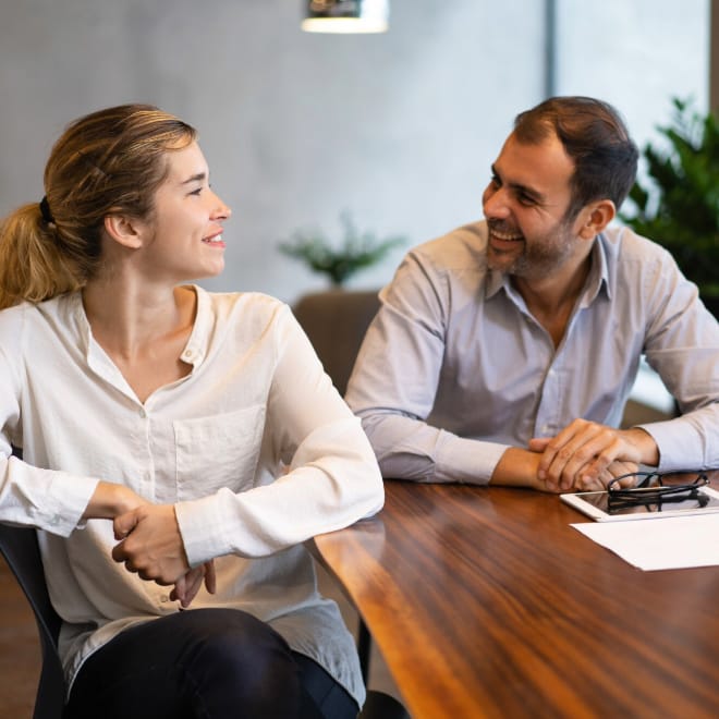 Happy Successful Business Colleagues Discussing Project 1262 17873 2